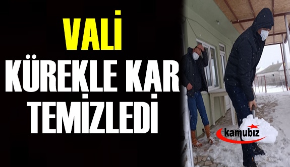 Vali Ekrem Canalp muhtarla birlikte kar temizledi